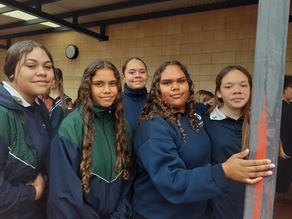 Five female Aboriginal Shenton students face the camera